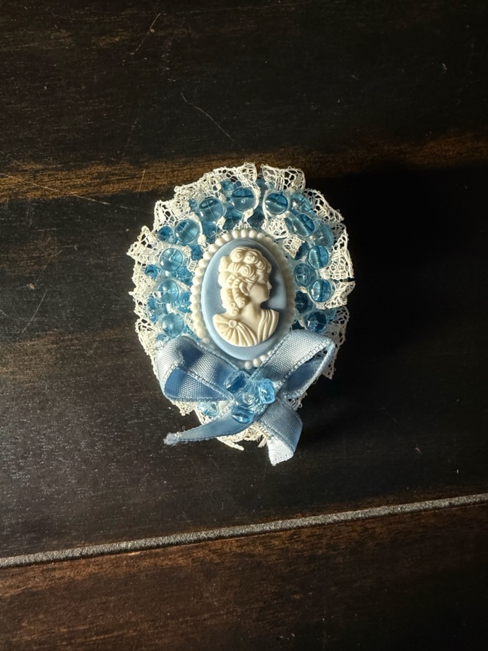 Vintage blue and white cameo brooch